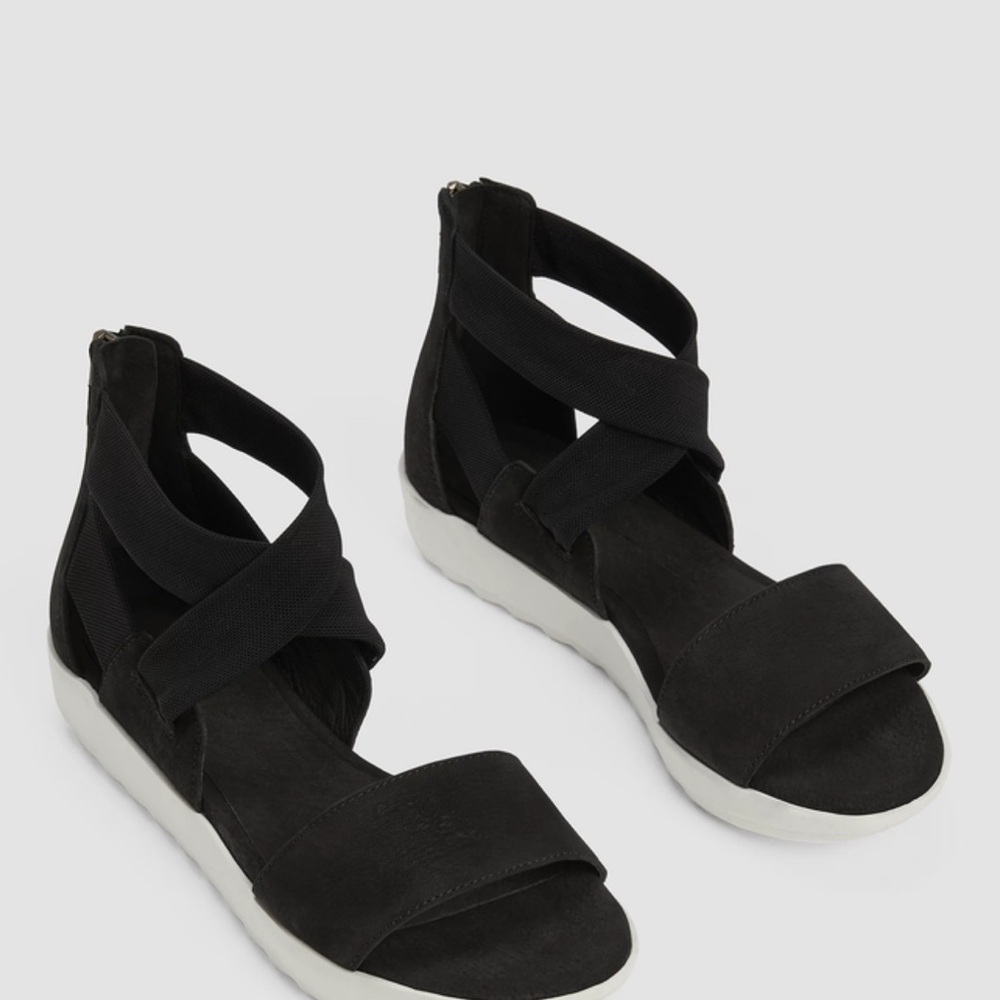 Eileen Fisher The look of a wedge sandal, the comfort of a sneaker.  Black ;